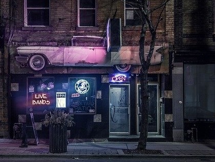 bar with open sign lit up