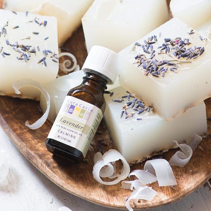 An Aura Cacia brand lavender essential oil bottle, one possiblity to use if you want to use essential oils for dogs safely